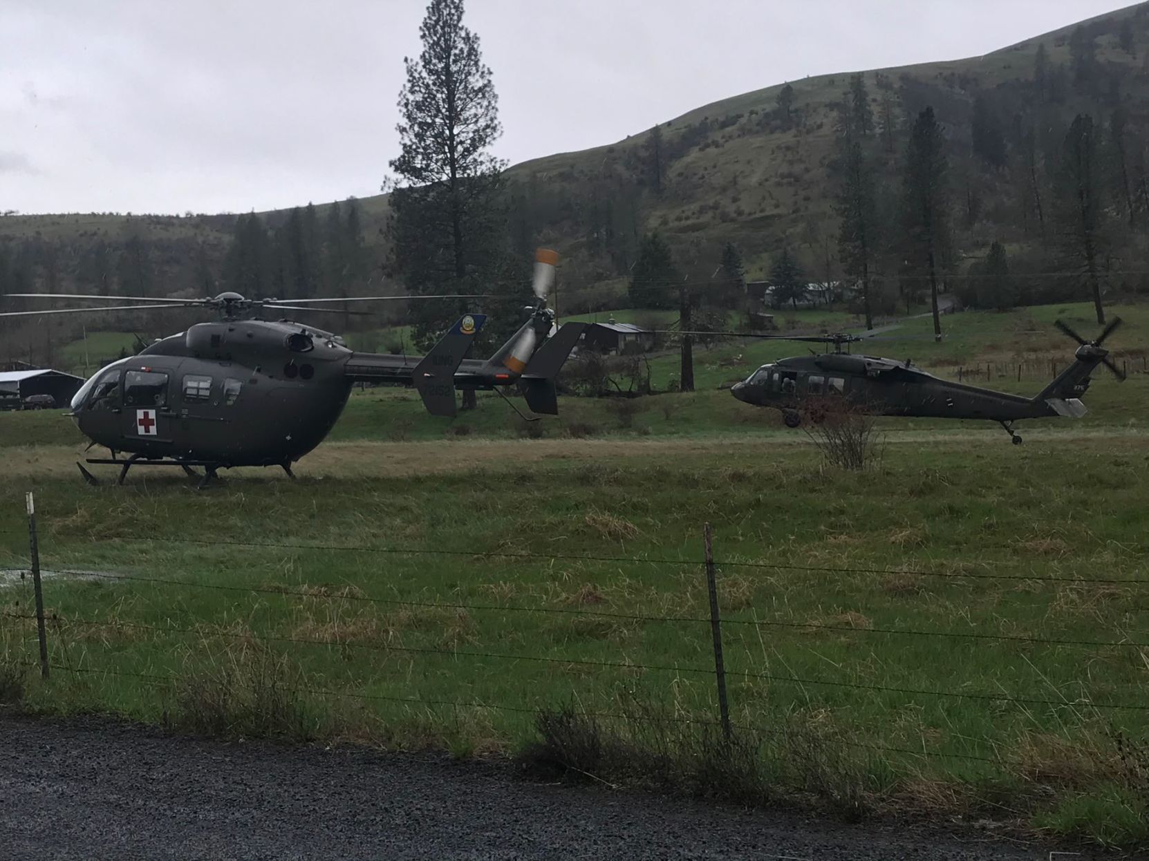 Military helicopters land in Stites
